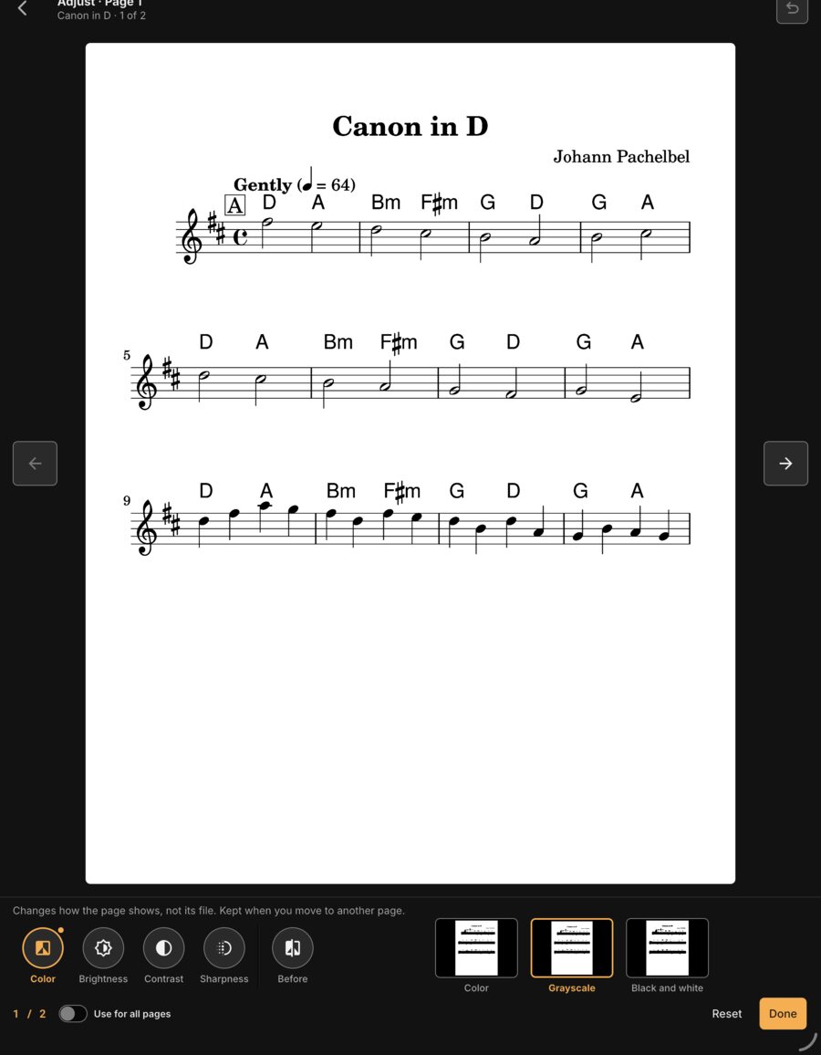 Adjust page: a page of Canon in D with Color, Brightness, Contrast, Sharpness and Before keys, and Color, Grayscale or Black and white.